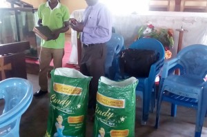 Widows Project Bags of rice distribution in progress