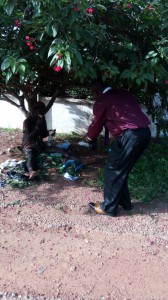 Dr-Ankamah-Feeding-a-homeless-mental-health- gentlemanGhana-Missions-2016IMG 2386     