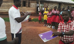Students-happily-receiving-school-stationery-missions-2016IMG 2413